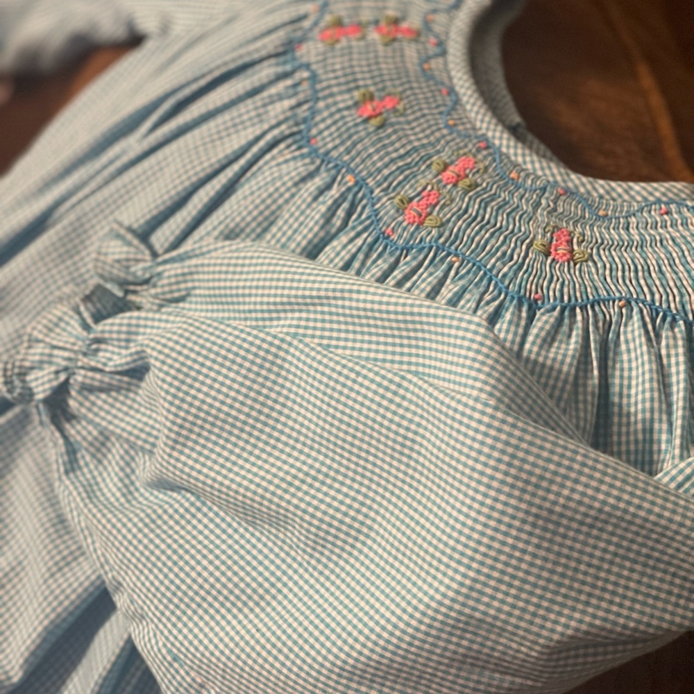 Long sleeve smocked dress. EUC,smoke free pet friendly home.